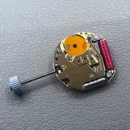 Swiss Ronda 775 quartz watch part with white date disk at 6 o'clock, ideal for precise repairs.