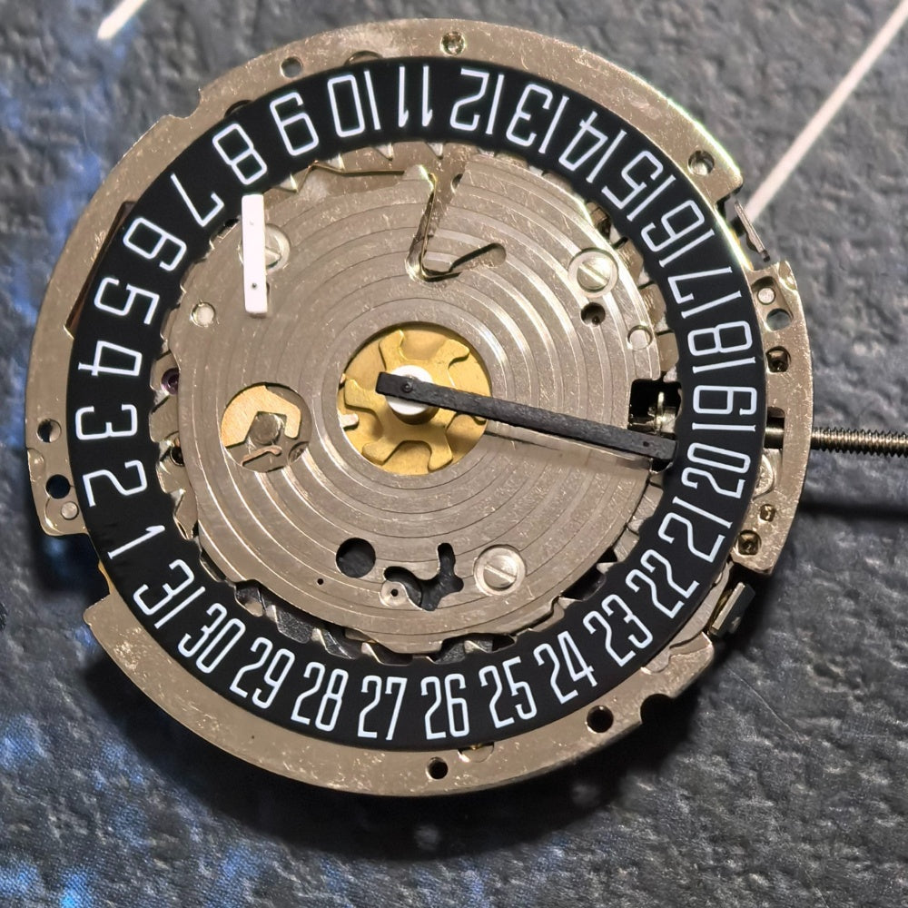 Swiss ISA 8171A quartz watch part with black disk date at 6, 4-hands movement for repair and replacement