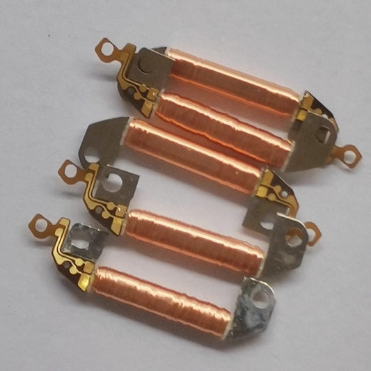 Japanese coil component for Seiko 5J21A quartz watch movement, essential for precise timekeeping.