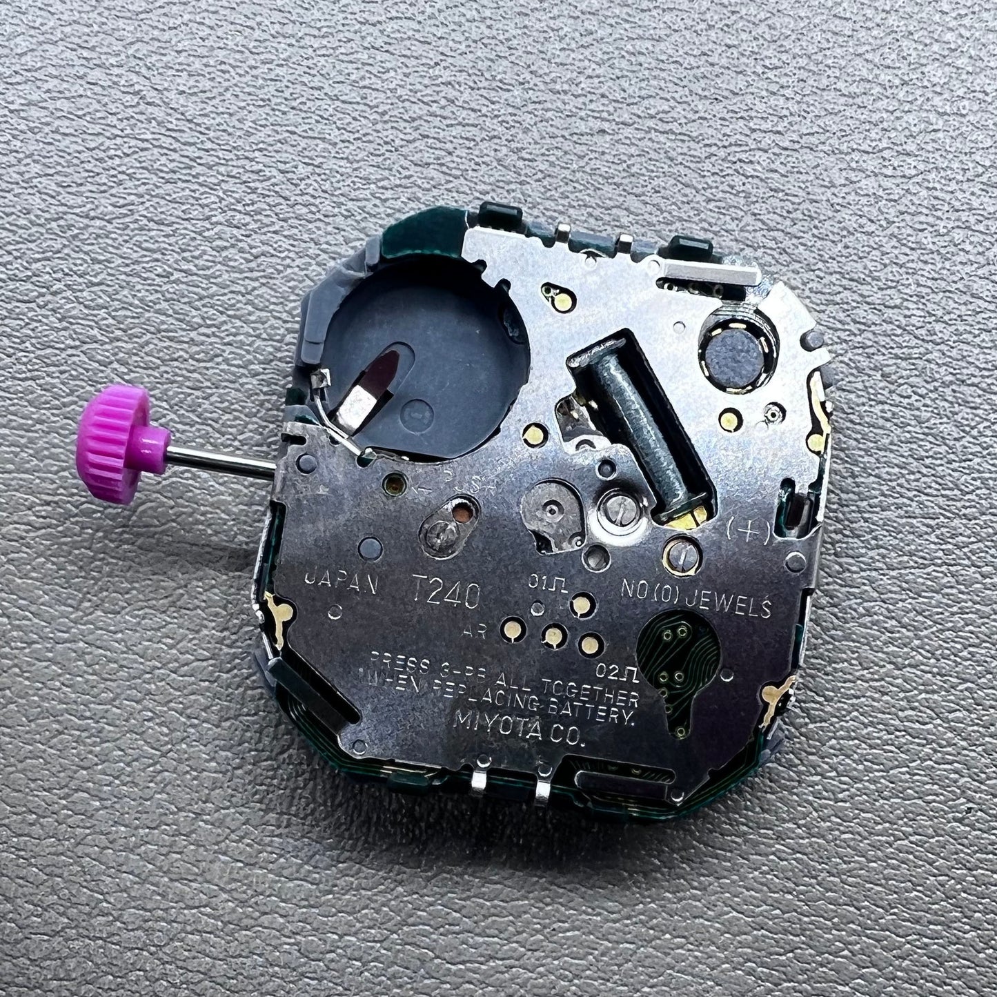 Japan T240 quartz watch movement with 3 hands and digital display, perfect for precise timekeeping accessories.