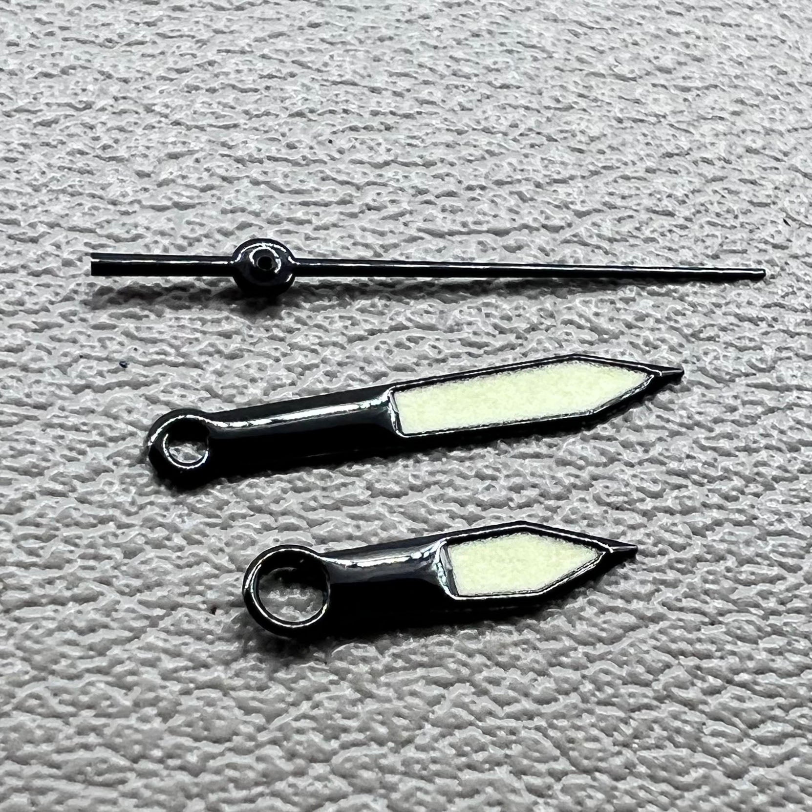 Black trim green lume watch hands set for Miyota 8215 with luminous tips, perfect for watch repairs and upgrades.