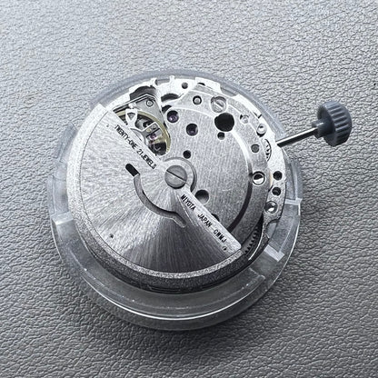Japan Miyota 8215 automatic watch movement with black dial and date display at 6 o'clock by Miyota.