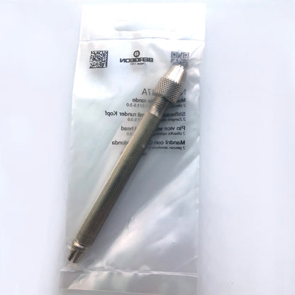 Bergeon 1842-17A pin vise holding precision watch parts, featuring two chucks for 0-3mm sizes