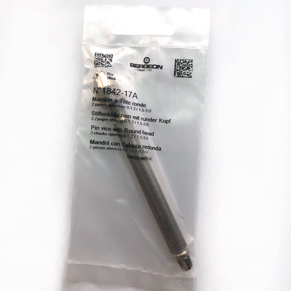 Bergeon 1842-17A pin vise holding precision watch parts, featuring two chucks for 0-3mm sizes