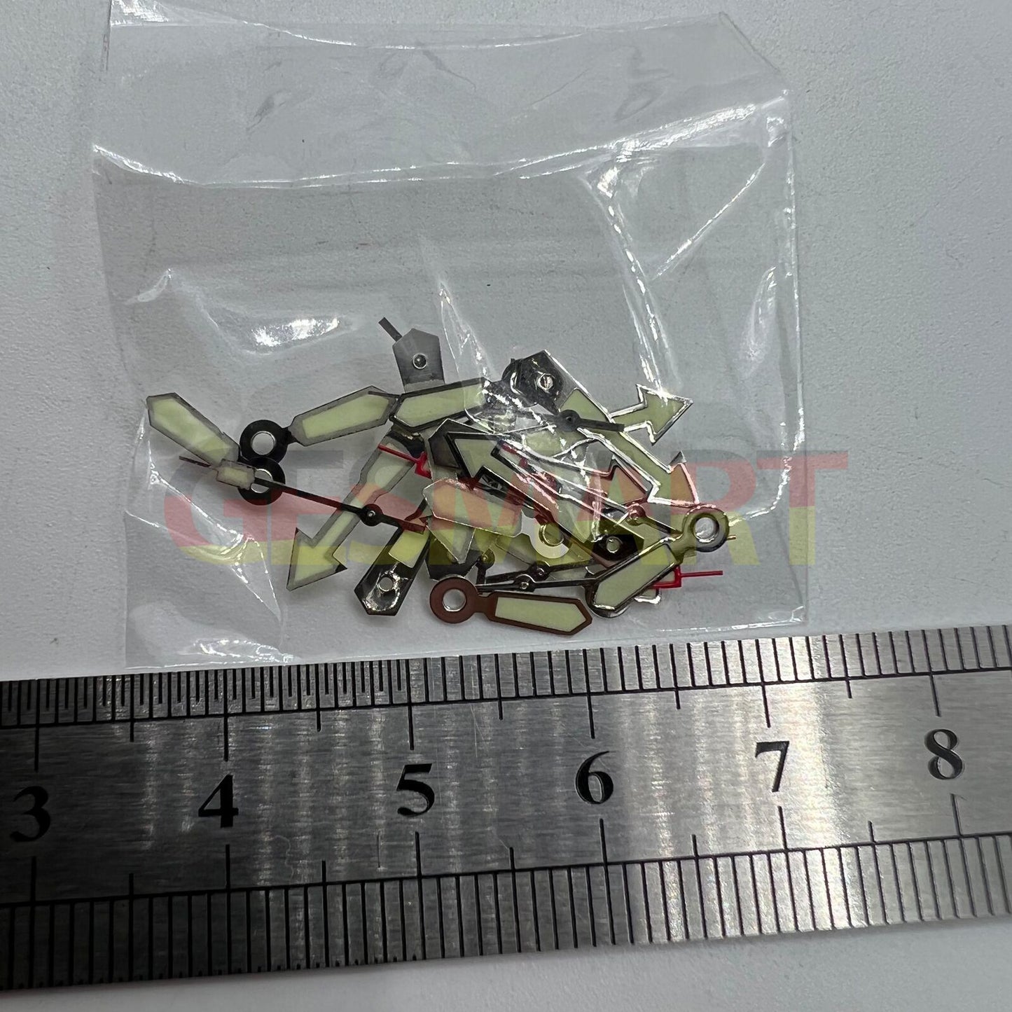 Silver arrow-shaped watch hand with green lume, compatible with Miyota 2035, 2115, 2105, 2305 movements.