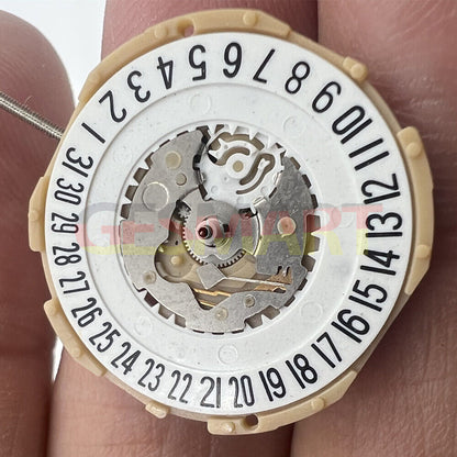 Sunon SP28 quartz watch movement with date at 6 o'clock and three hands for precise timekeeping