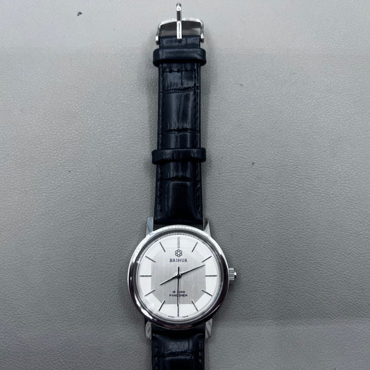37mm China manual mechanical watch with black strap, silver dial, 19 jewels, shock-resistant design.
