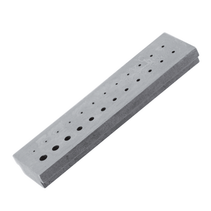 Bergeon 1901 hardened steel riveting stakes set with 24 holes, 0.5-2.2mm for precise watch repairs.