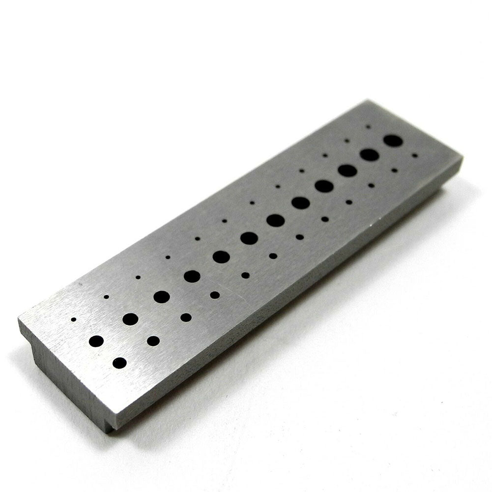 Bergeon 1902 steel staking block for precise riveting in watch accessories and repairs.