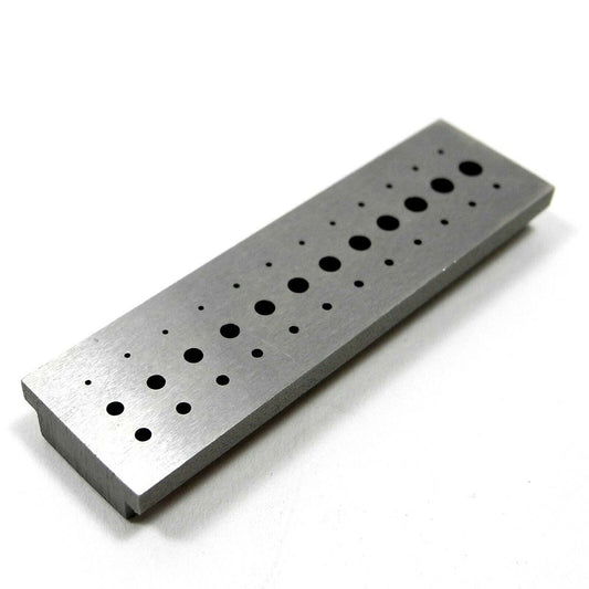 Bergeon 1902 steel staking block for precise riveting in watch accessories and repairs.