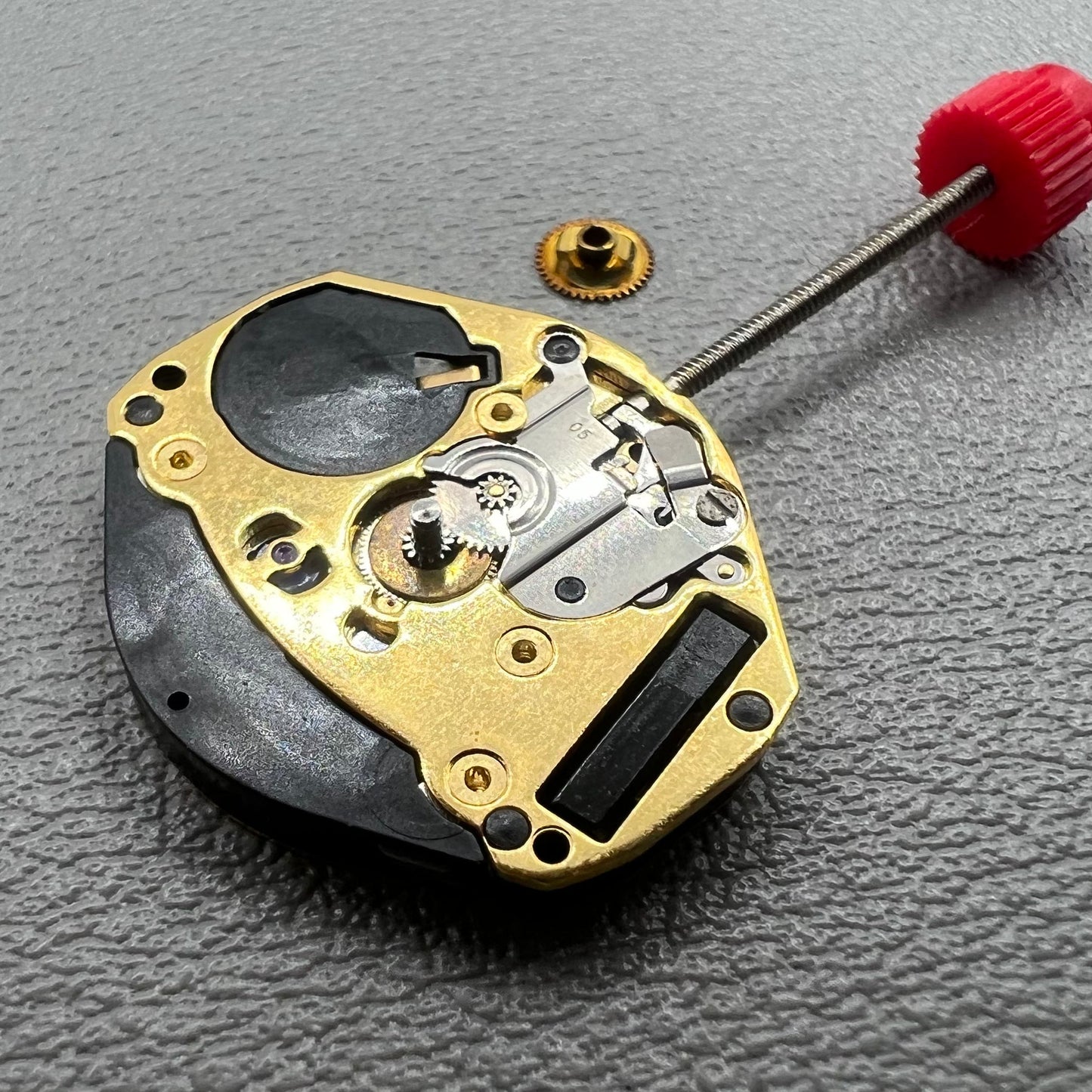 Swiss ETA 902.002 quartz watch movement with two hands, precision engineering by ETA.