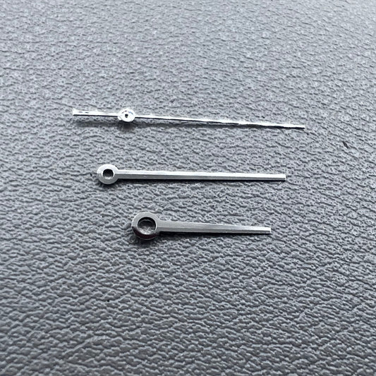 Silver 3 hands for ETA C07.111 movement, no lume, modified design by T086 for watch accessories.