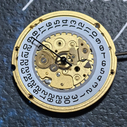 Swiss Made ETA255.412 quartz movement watch part with white disk, ideal for precise 3-hand watch repairs.