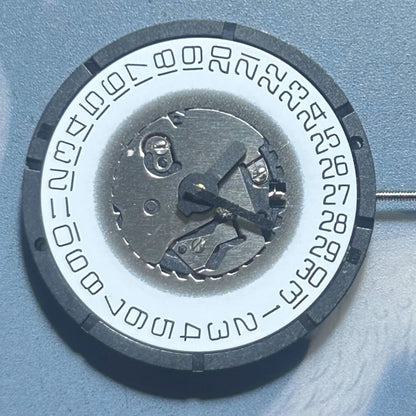 Swiss Made ISA 2331 quartz watch movement with date function for precise repairs and replacements.