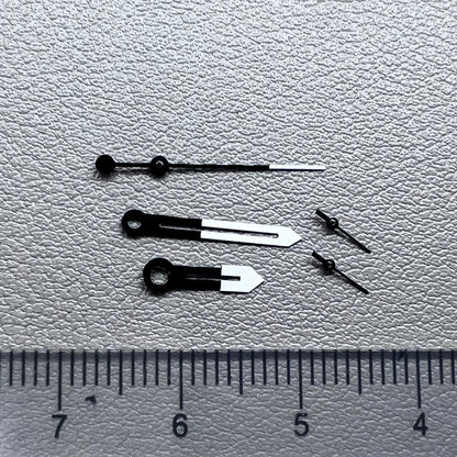 White and black watch hands designed for Ronda 5021D quartz movement.