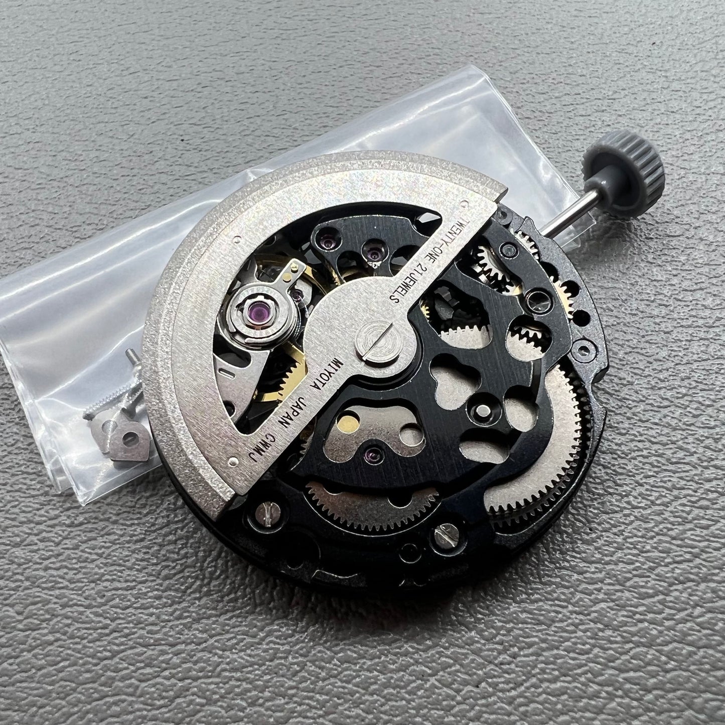 Genuine Miyota 8N24 black hollow automatic mechanical watch movement by Citizen for precise timekeeping