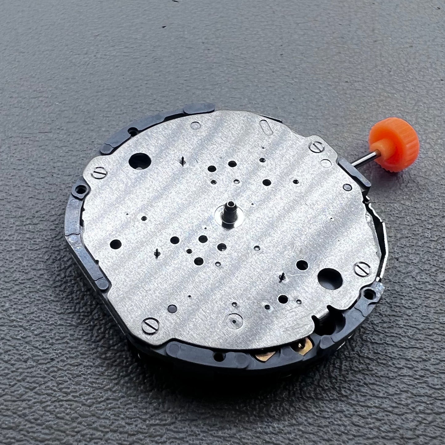 Japan Miyota JS10 quartz movement watch with small second hands at 6, 9, and 12 o'clock positions.