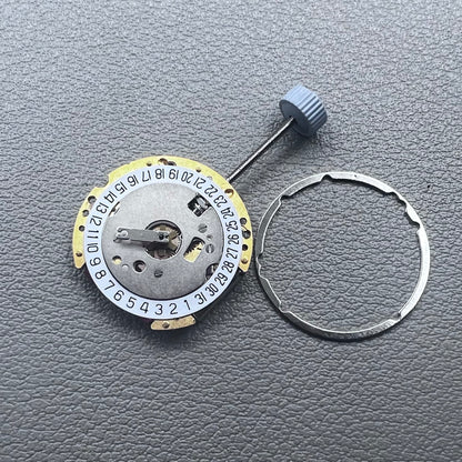 Swiss Ronda 775 quartz watch part with white date disk at 6 o'clock, ideal for precise repairs.