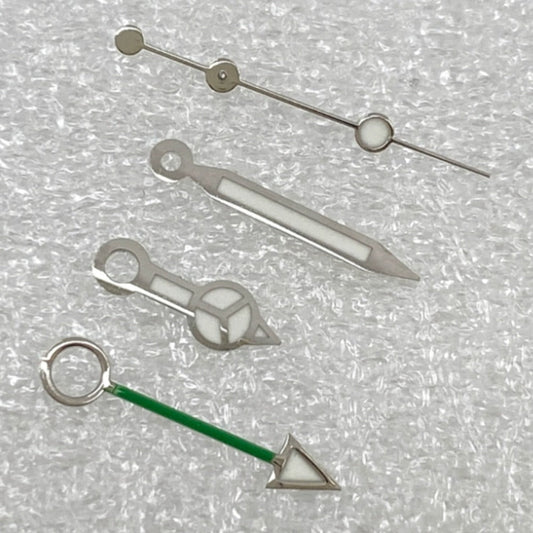 Silver-trimmed green GMT watch hands with BGW9 lume, compatible with NH34 movement, for precise timekeeping.