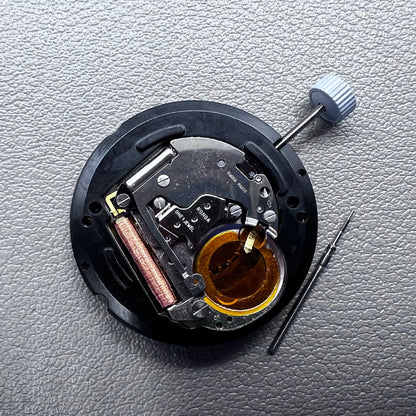 Swiss Ronda 715 quartz watch movement with date display at 3 o'clock, precision timing for accessories.
