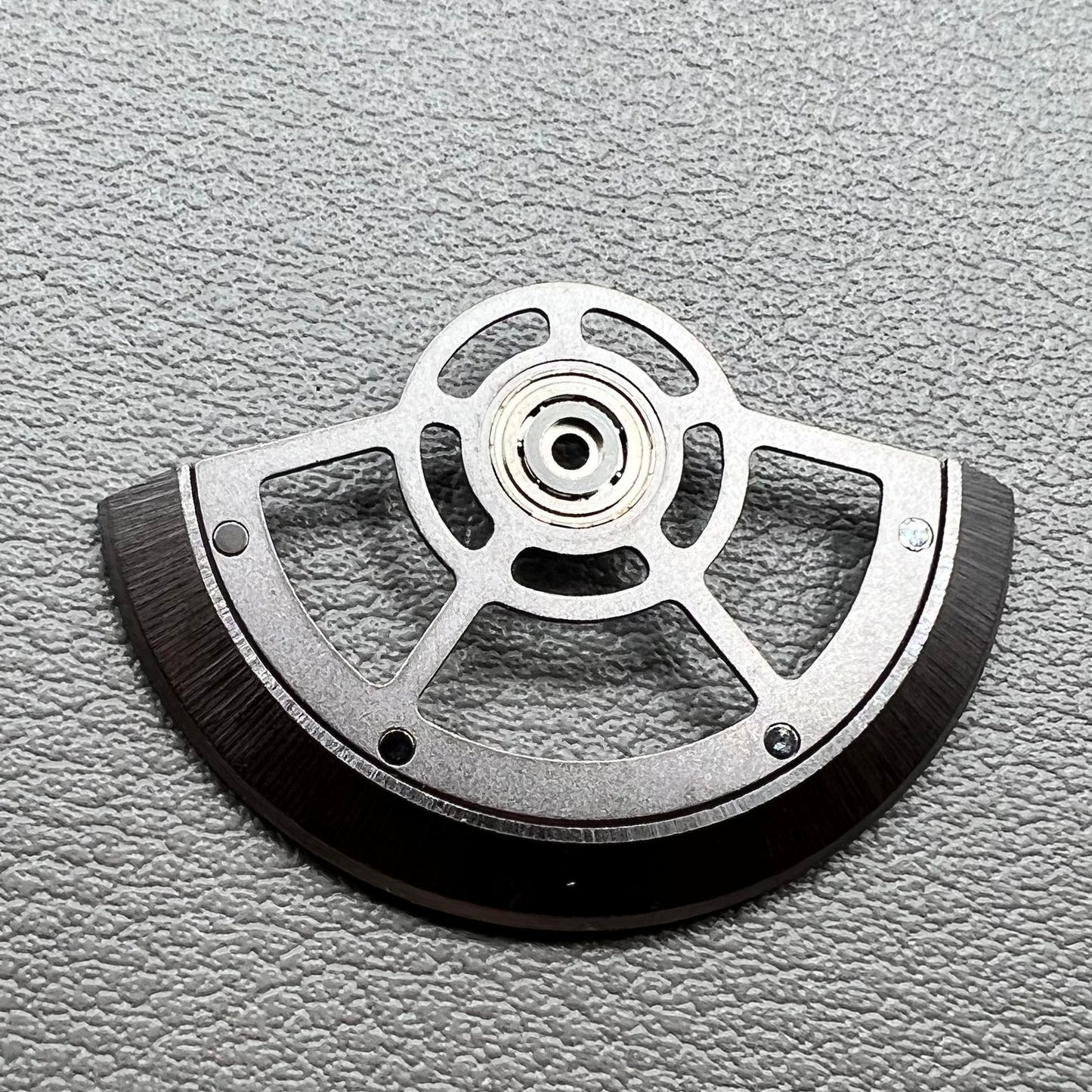 Black hollow rotor oscillating weight for China Made SL4802 mechanical watch movement, enhancing precision and style.