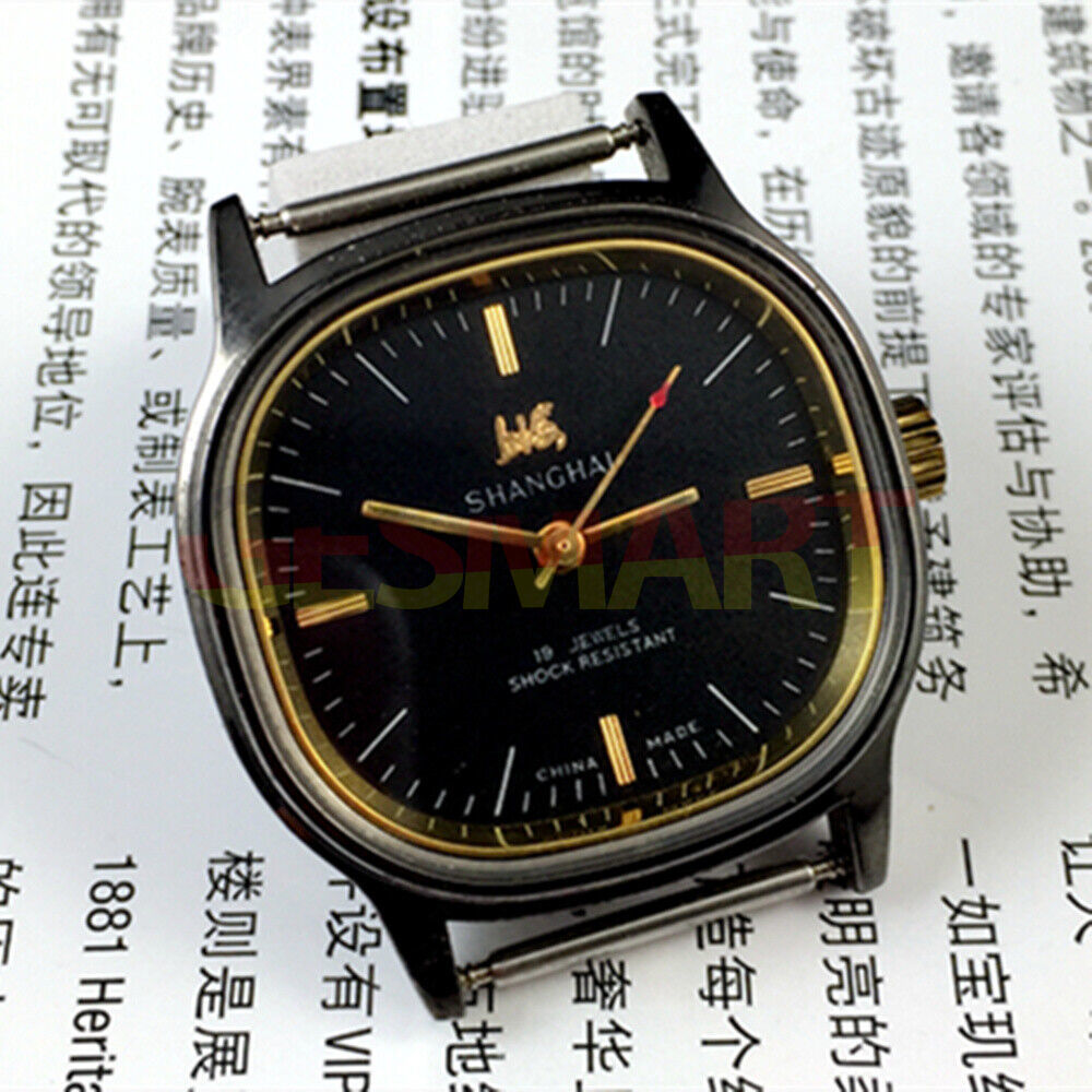 Shanghai Factory 34mm manual mechanical watch with black dial, 19 jewels, shock-resistant, elegant design for everyday wear.