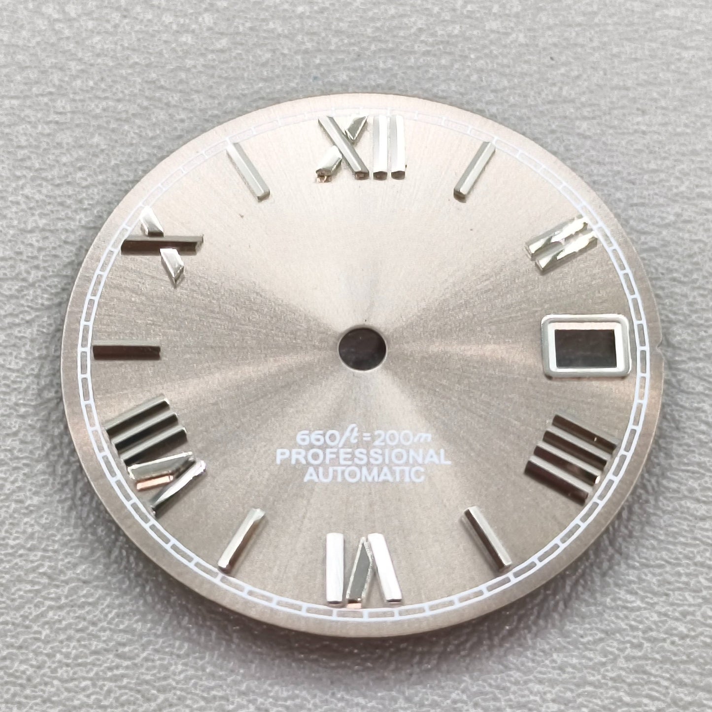 watch dial with S logo