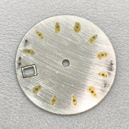 watch dial with S logo