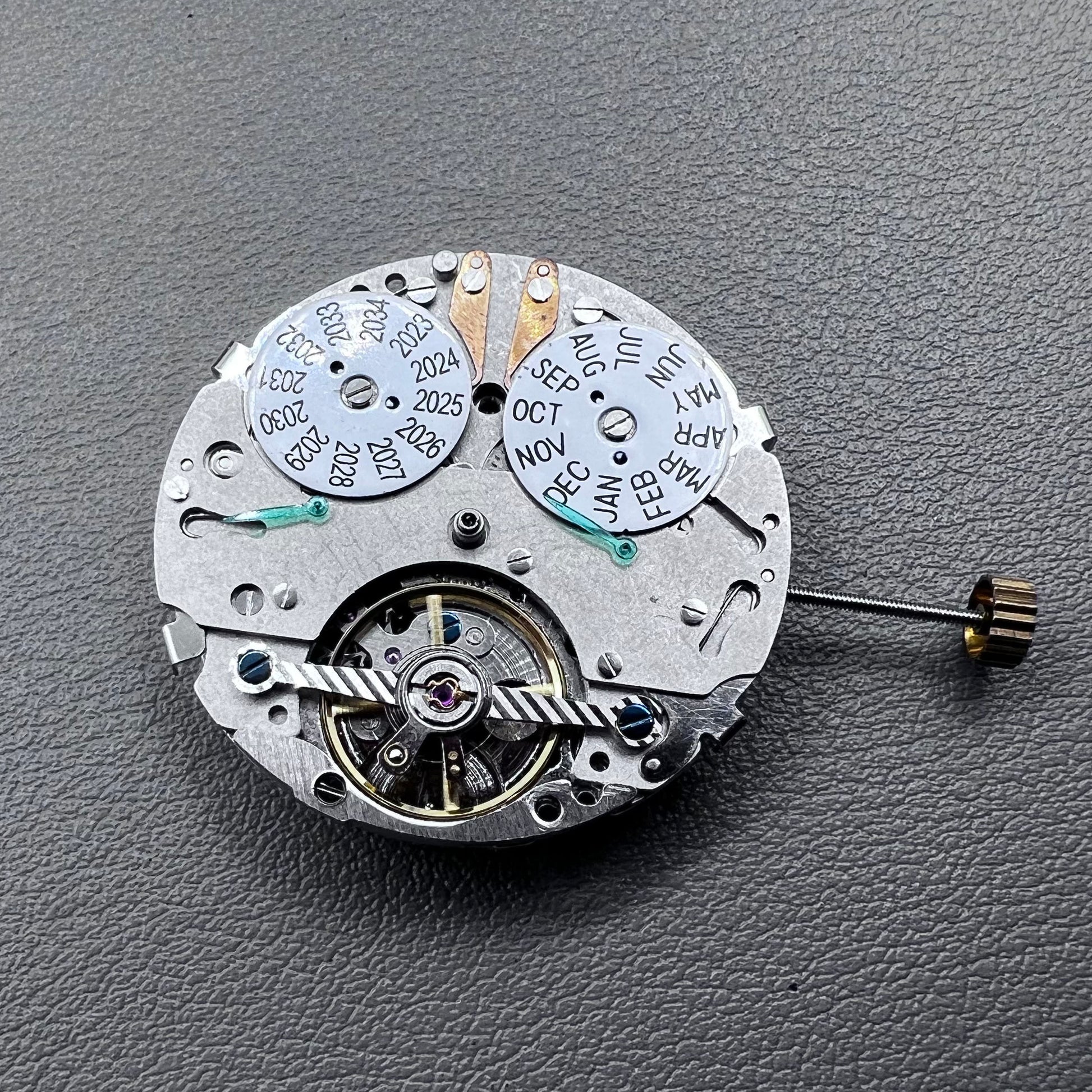 China multifunctional perpetual calendar watch accessory showcasing automatic mechanical movement details.
