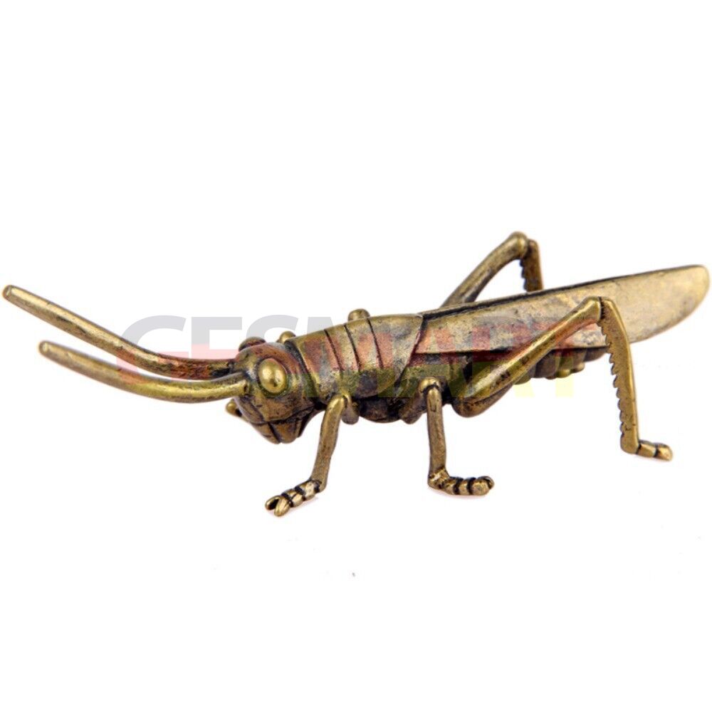 Hand-carved solid copper grasshopper figurine with vintage bronze finish, perfect watch accessory.