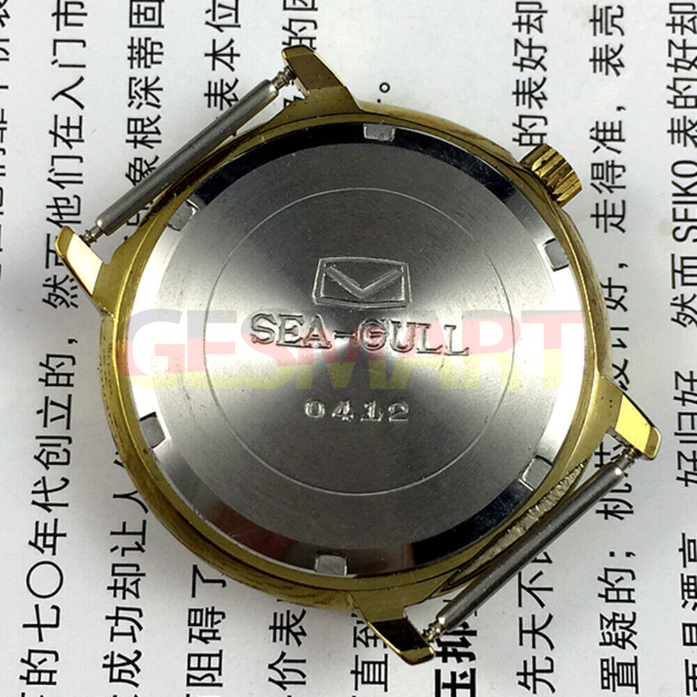 35mm round golden Tianjin Seagull watch with manual mechanical movement and elegant golden dial.