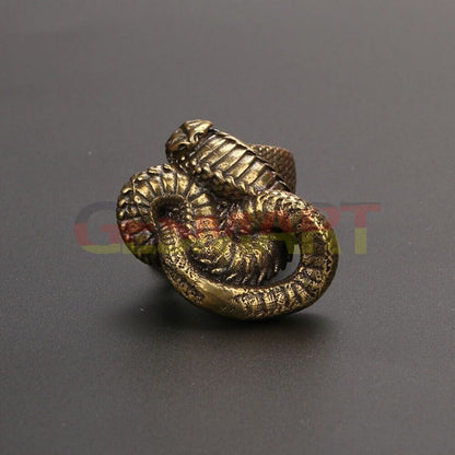 Solid copper cobra trinket, vintage hand-carved bronze figurine, detailed snake sculpture.