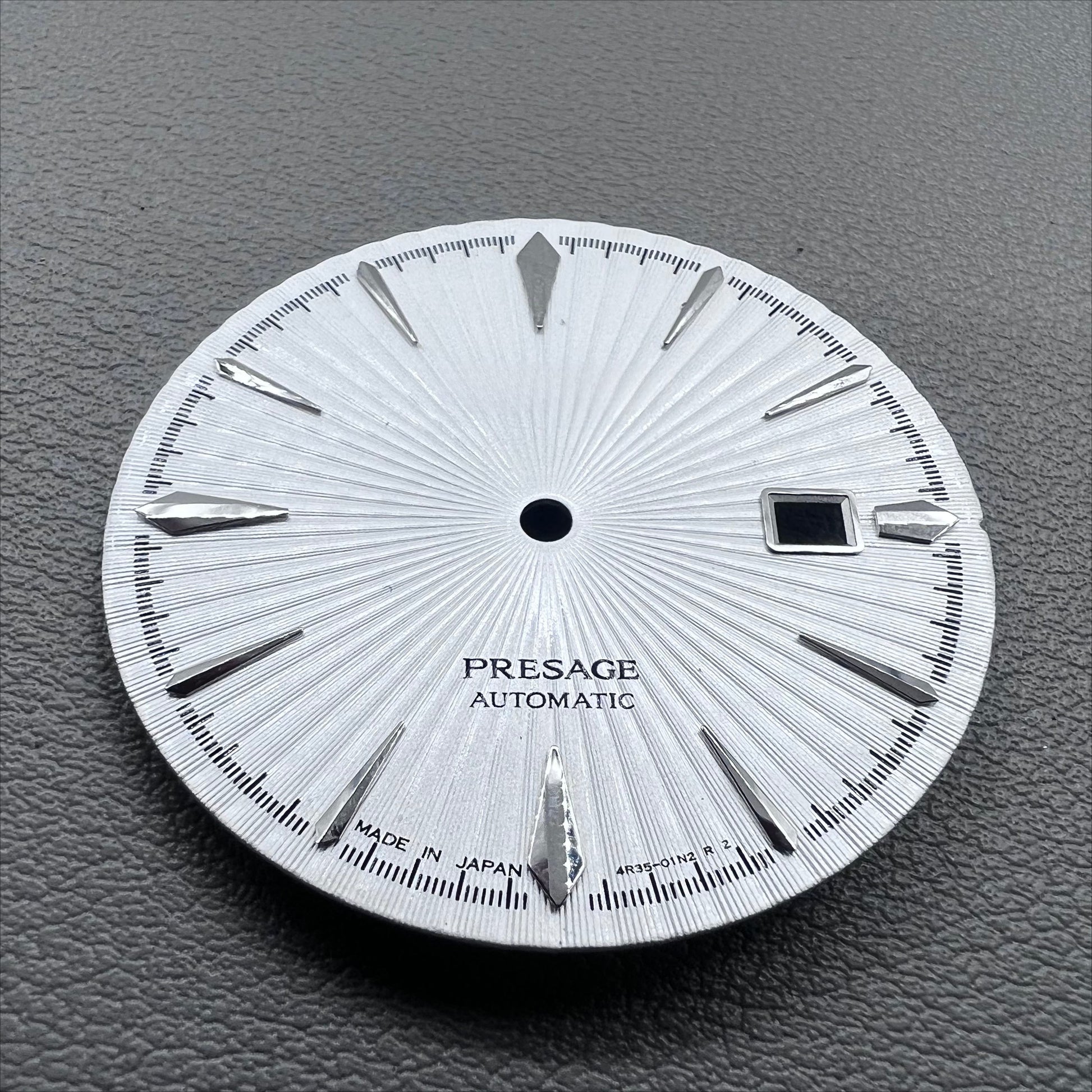 35mm silver watch dial with white cocktail markers, no lume, compatible with NH35 movement by Nail+White.
