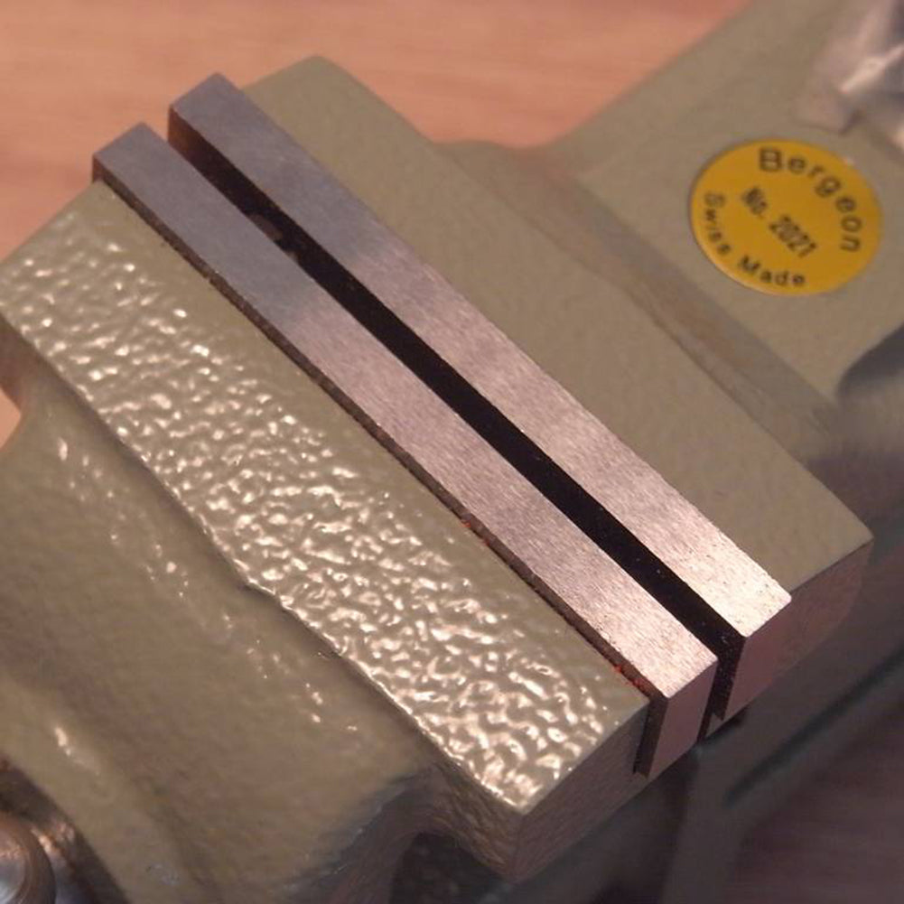 Bergeon 2021 watch vice with smooth parallel jaws for precise watch repair and adjustment tasks.