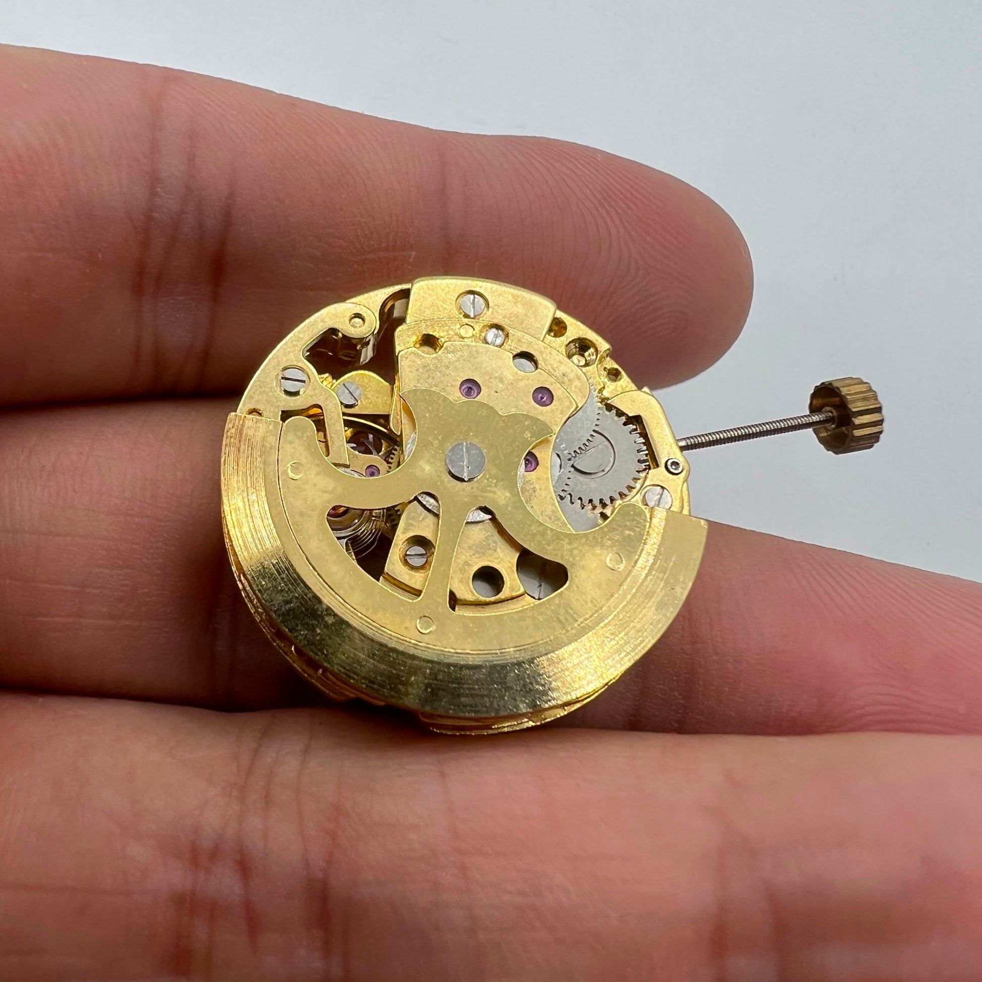 Golden hollow 26.5mm 7120 automatic mechanical watch movement, precise and elegant timepiece mechanism.