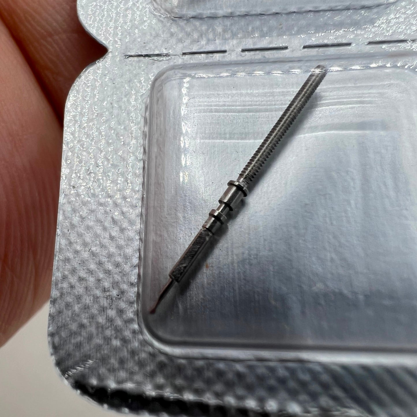 Omega 8500 watch winding stem by Brand New, precision replacement part for smooth time adjustment.