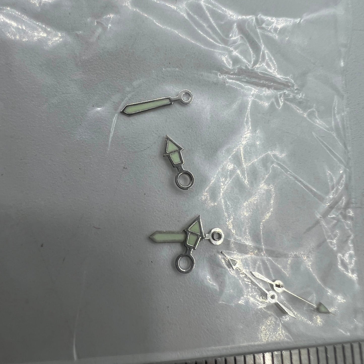 Luminous silver trim watch hands set in 12mm, 10mm, 7mm sizes for Miyota 2035 by #1523, ideal for precise timekeeping.