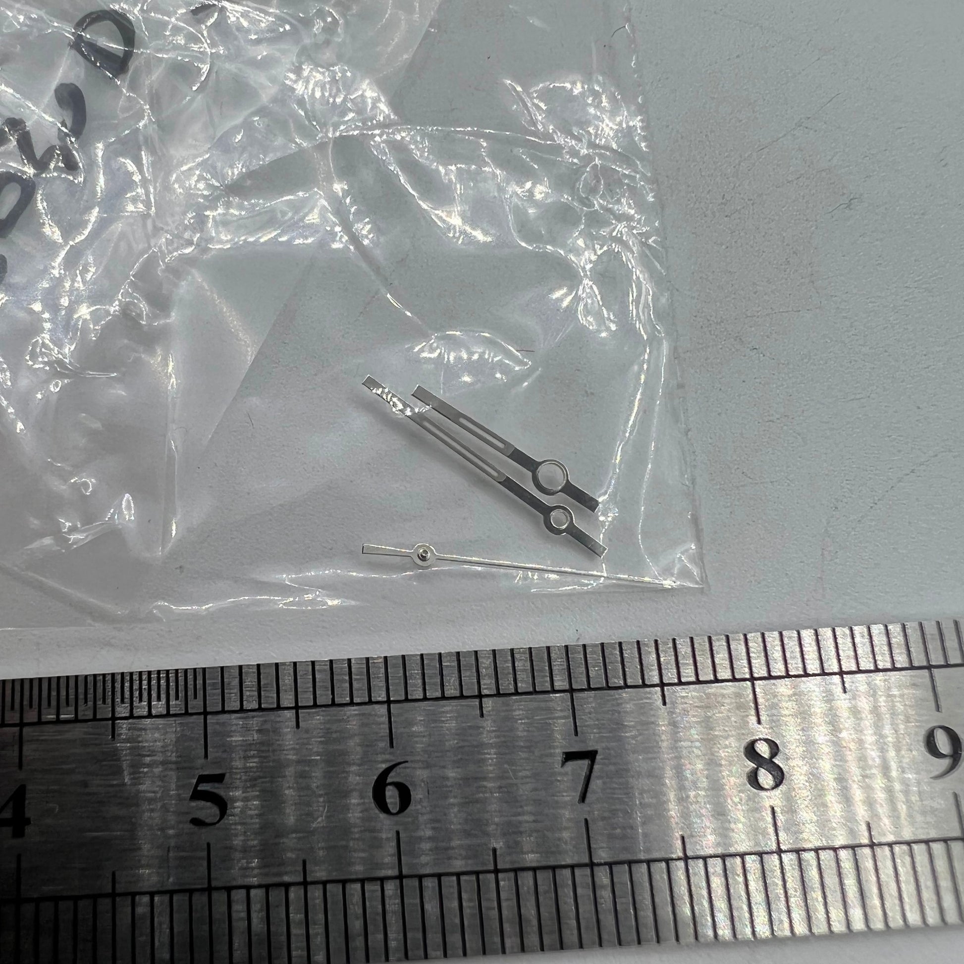 Luminous watch hands by Ronda for 5030.D quartz movement, improving visibility and elegant design.