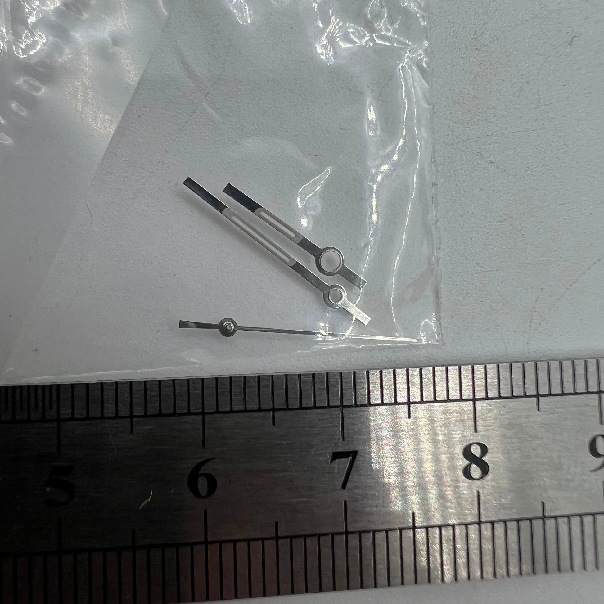 Luminous watch hands by Ronda for 5030.D quartz, ensuring clear time reading in low light.