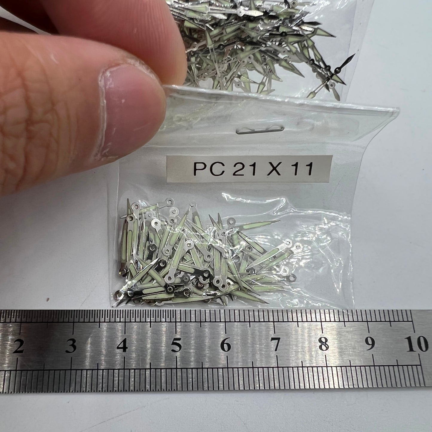 Lot de 100 aiguilles de montre argentées de 11 mm avec luminescentes pour mouvement à quartz Epson PC21