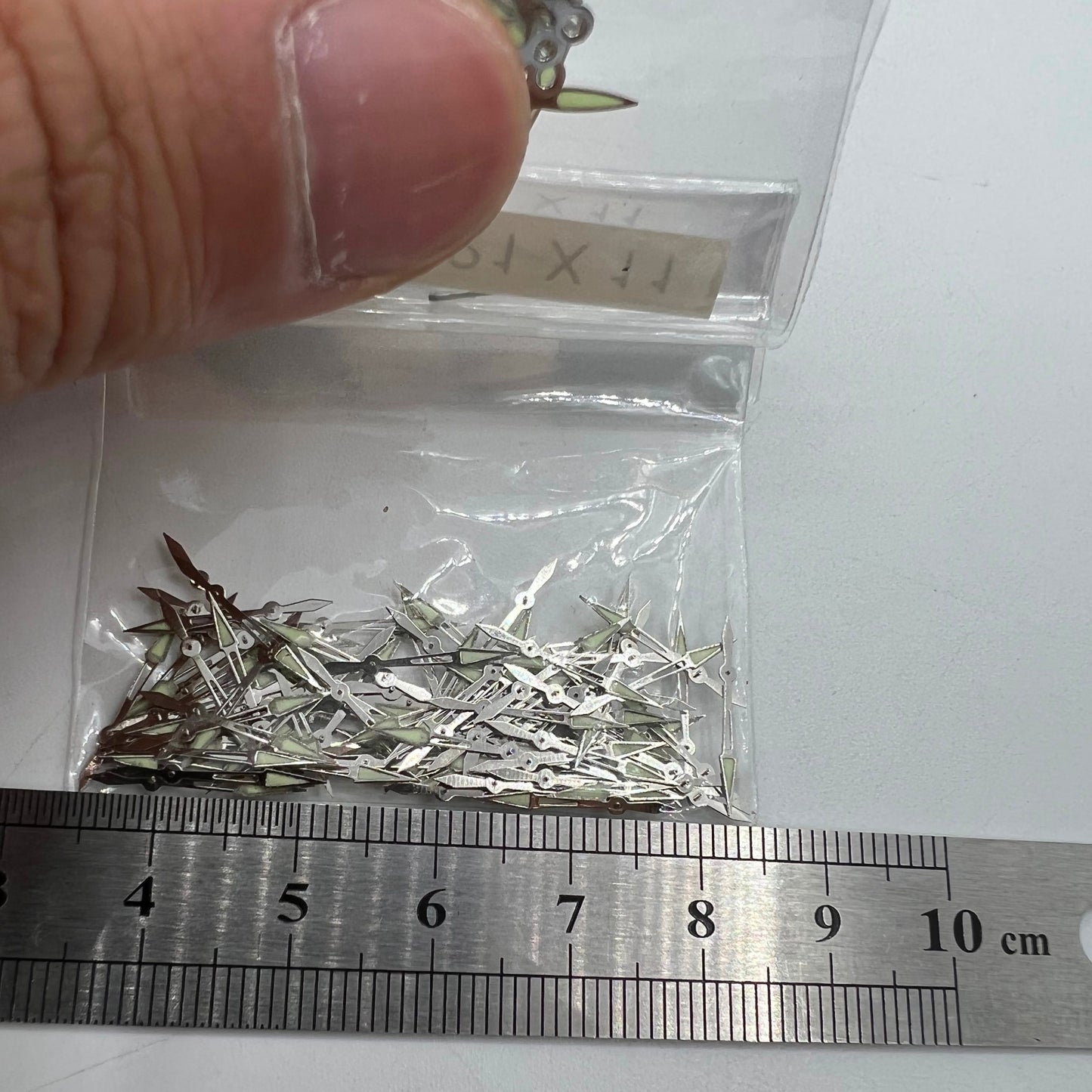 Lot de 100 aiguilles de montre argentées de 11 mm avec luminescentes pour mouvement à quartz Epson PC21