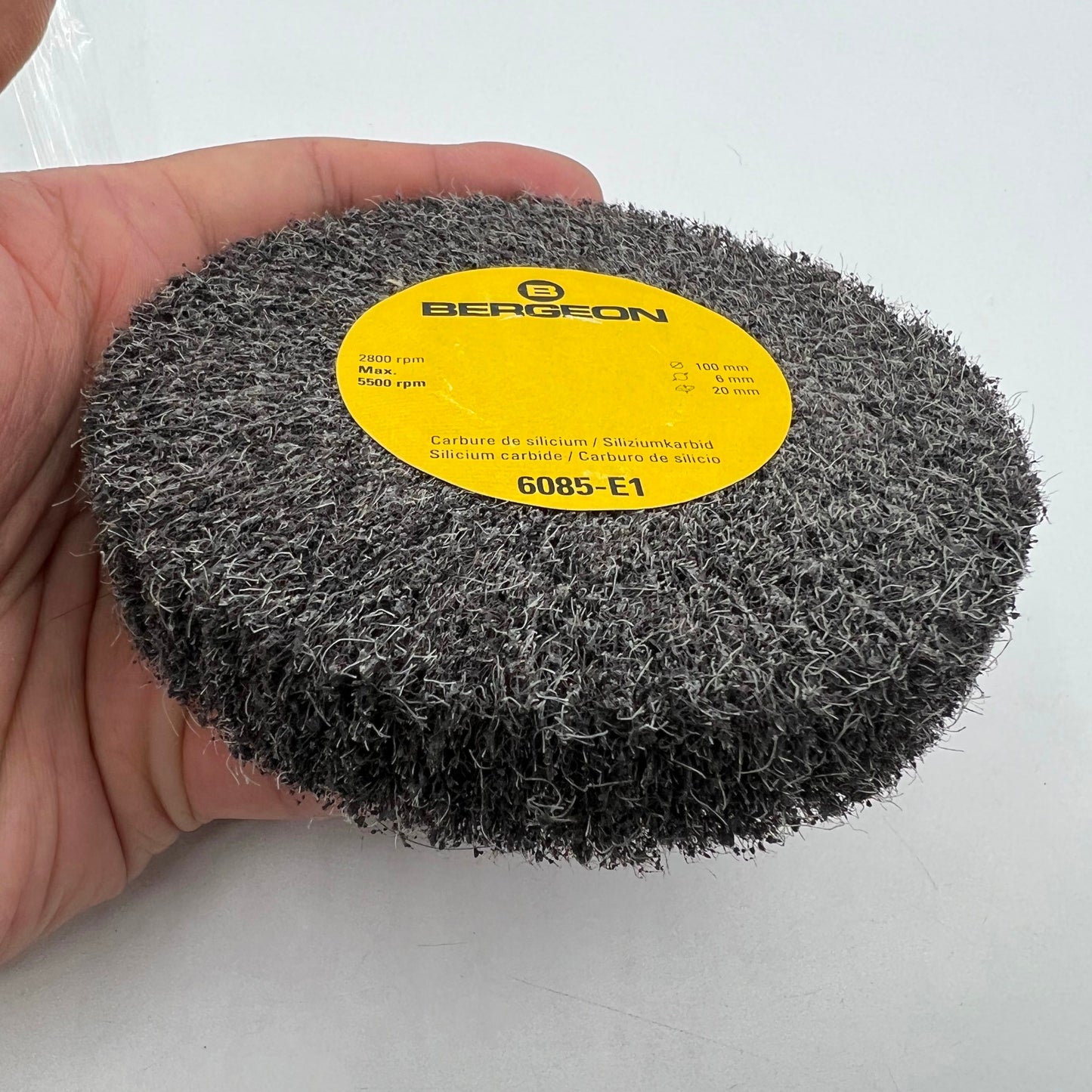 Bergeon 6085-E1 satin metal finishing wheel for watch polishing and surface refinement.