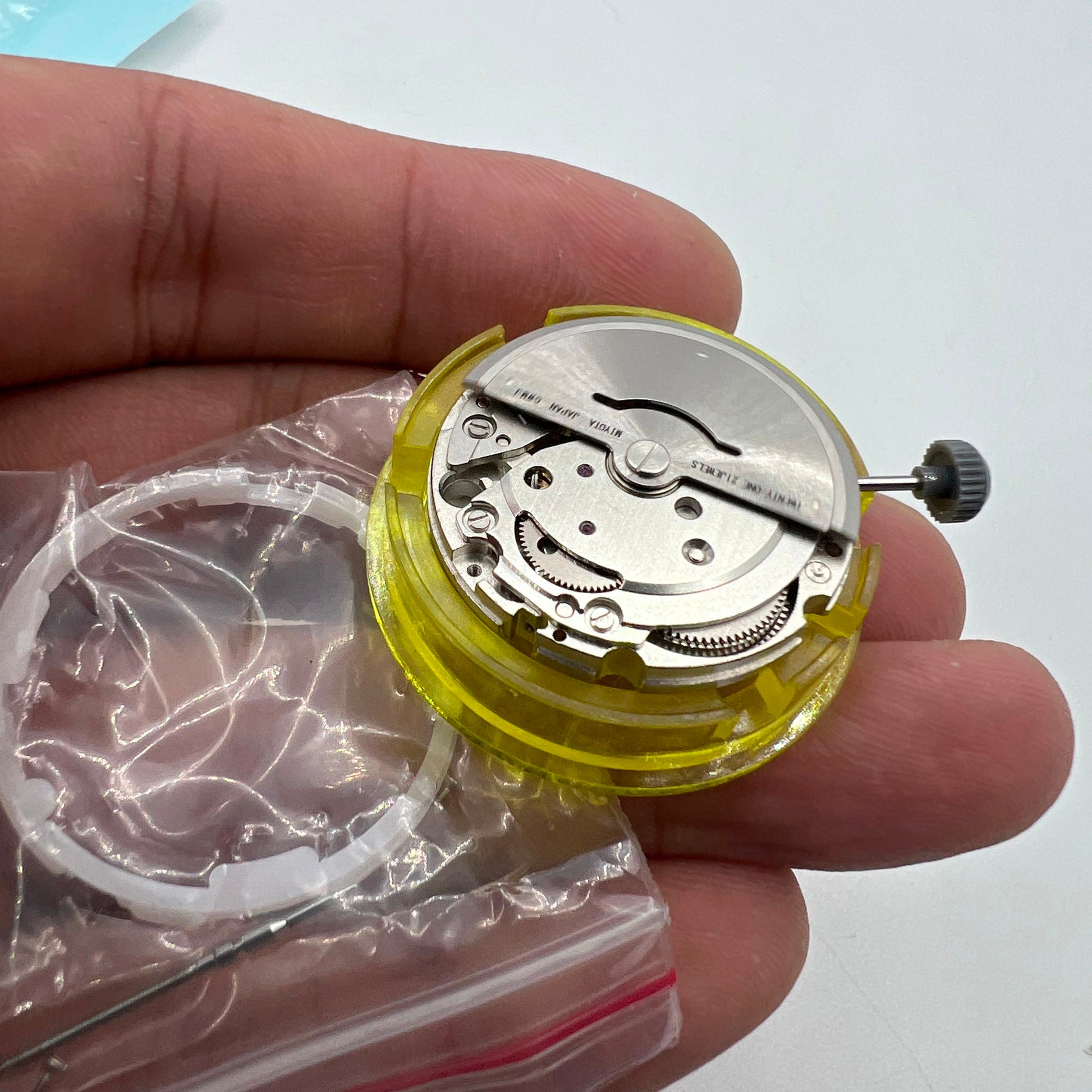 Miyota Citizen 8205 automatic watch movement with silver finish for precise mechanical timekeeping.