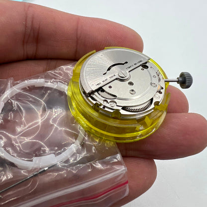 Miyota Citizen 8205 automatic watch movement, silver plated finish, precise mechanical timekeeping.