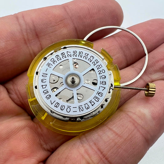 Silver China Made 2813 8205 automatic watch movement showing single calendar at 3 o'clock position