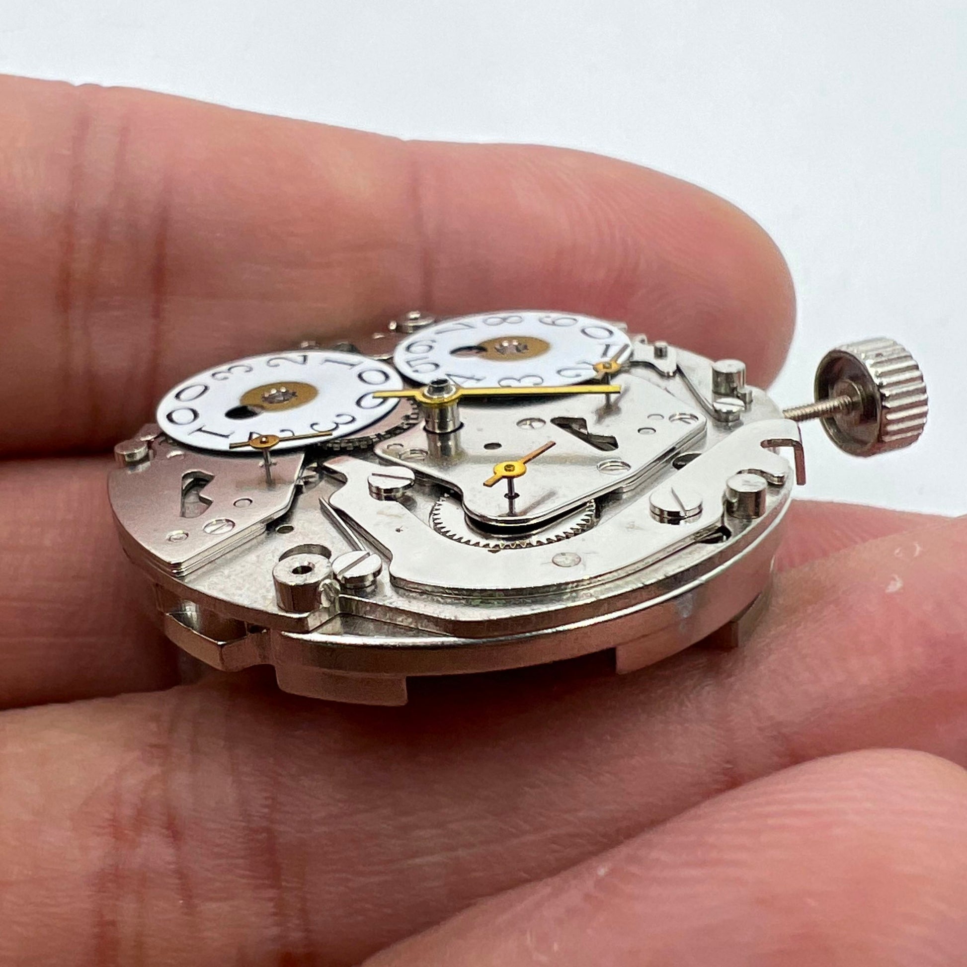 Seagull ST2525 automatic watch movement with big date display at 12, precision Chinese craftsmanship.