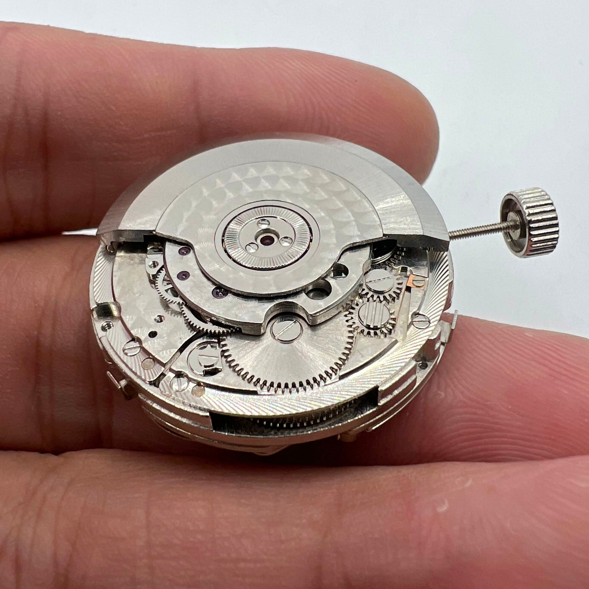 Seagull ST2525 automatic watch movement with big date at 12, precision mechanical function accessory.