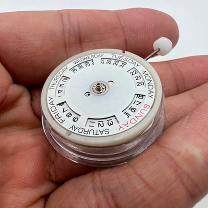 Silver automatic watch with MINGZHU 2813 mechanical movement, date and day display features.