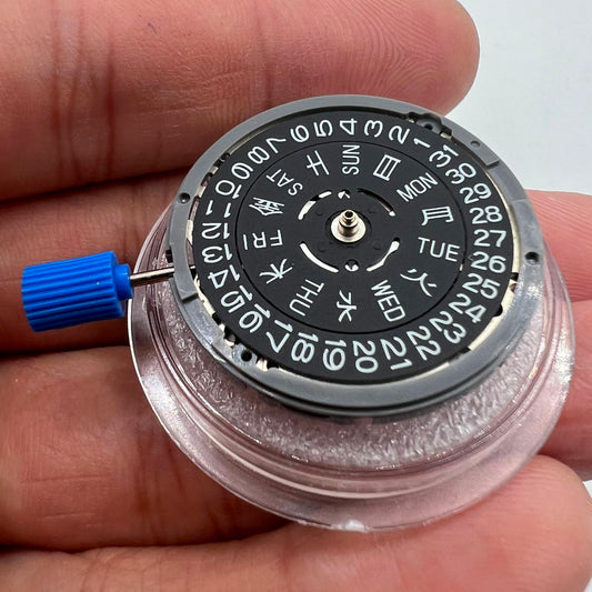 Miyota NH36A automatic watch movement with black finish, green lume, and 3.8mm crown for precision winding