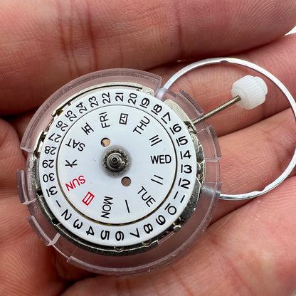 DG2813 automatic watch movement displaying intricate mechanical gears and day-date function for replacement parts.